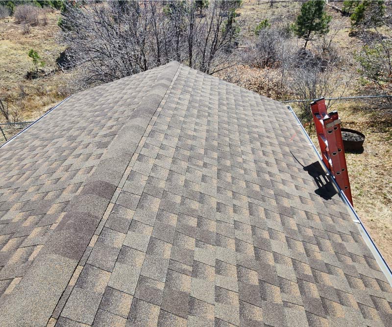 Newly installed asphalt shingle roof on a residential home near Los Alamos, NM after a free roof inspection